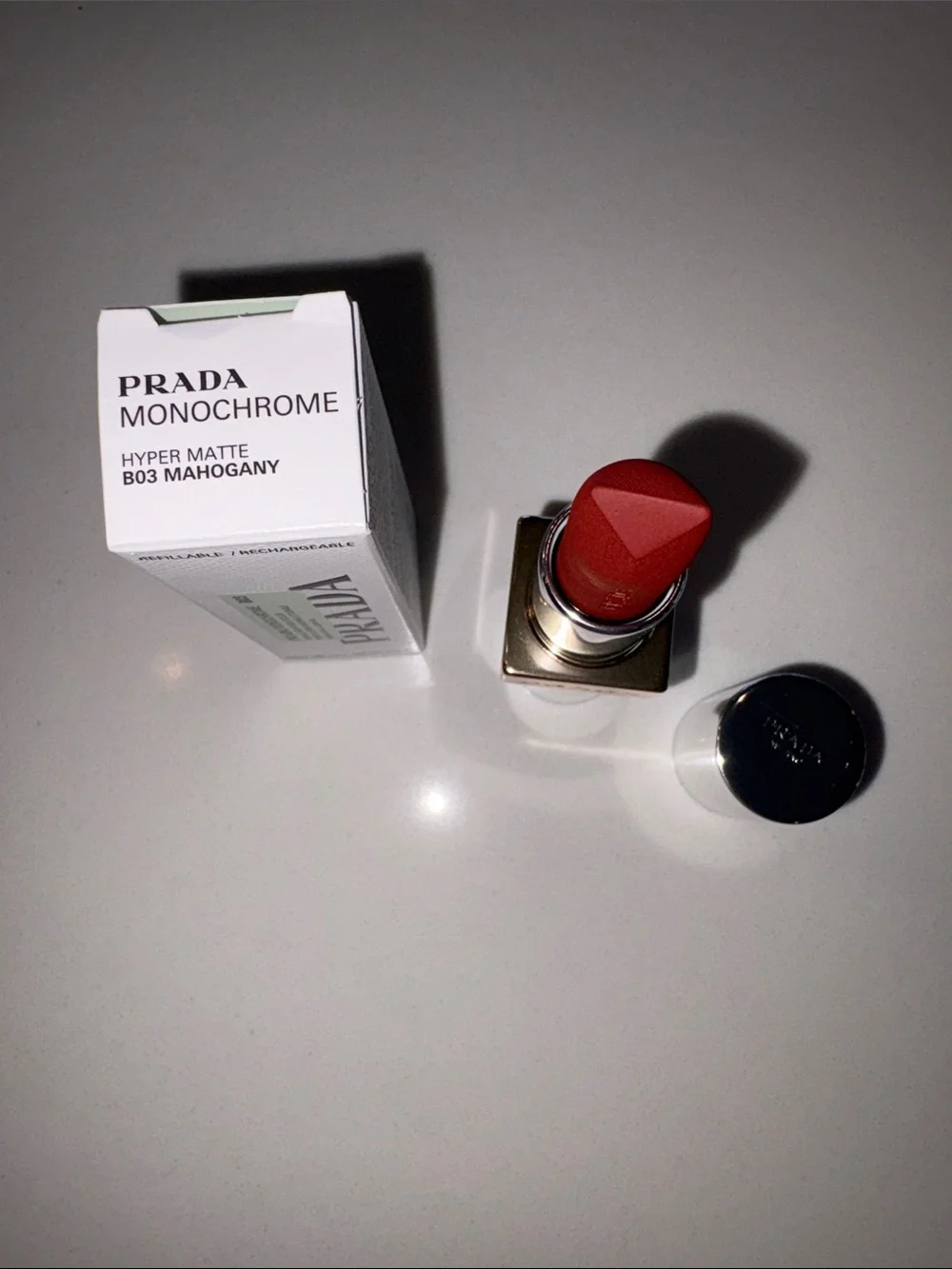 Prada Monochrome Hyper Matte Lipstick in shade B03 Mahogany